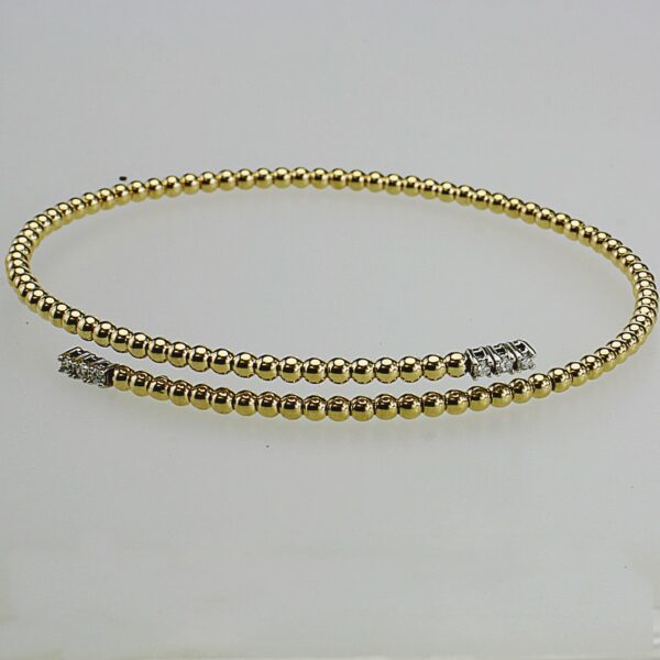 BRACCIALE RIGIDO IN ORO CON DIAMANTI