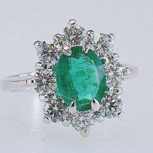 ANELLO IN ORO CON DIAMANTI E SMERALDO