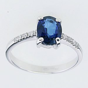 ANELLO IN ORO 750/°°° CON BRILLANTI E ZAFFIRO