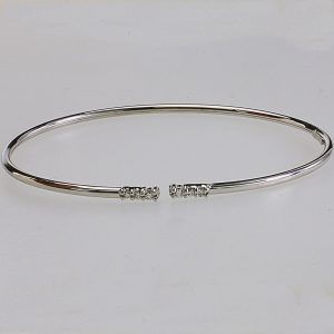 BRACCIALE RIGIDO IN ORO CON DIAMANTI