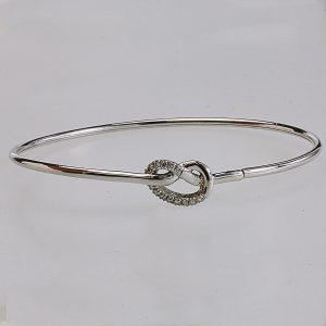 BRACCIALE RIGIDO IN ORO CON DIAMANTI