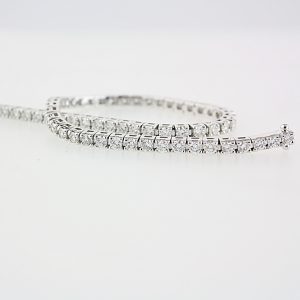 BRACCIALE TENNIS IN ORO BIANCO TITOLO 750/°°° CON DIAMANTI  KT 3,04 G VS